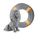 Une bobine de recharge Prusament PLA Galaxy Silver à côté d'un lion argenté imprimé