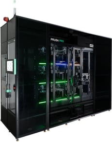 The Prusa Pro AFS, a tall glass-fronted cabinet holding shelves of CoreXY printers with a robotic arm moving between them