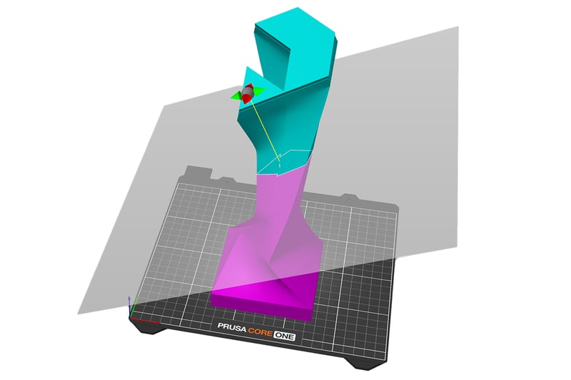 Cut tool splitting a large model with alignment pins shown at the cut interface