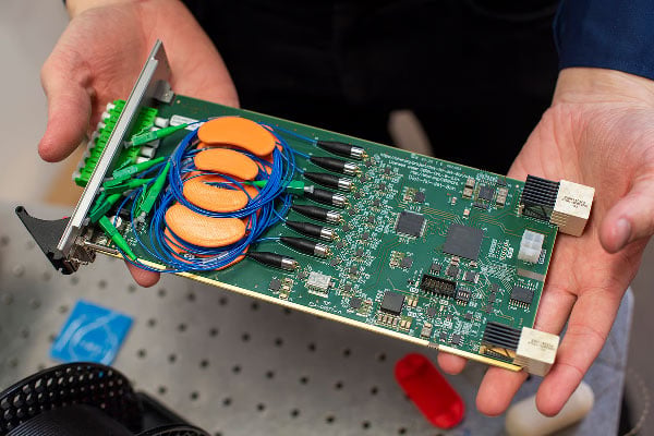 3D printed cable management spools on a circuit board