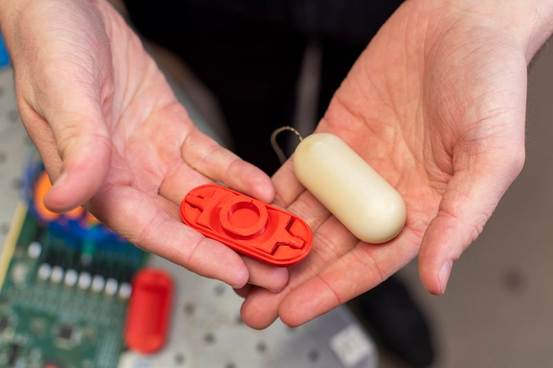 CERN engineers with Prusa printers in a research lab