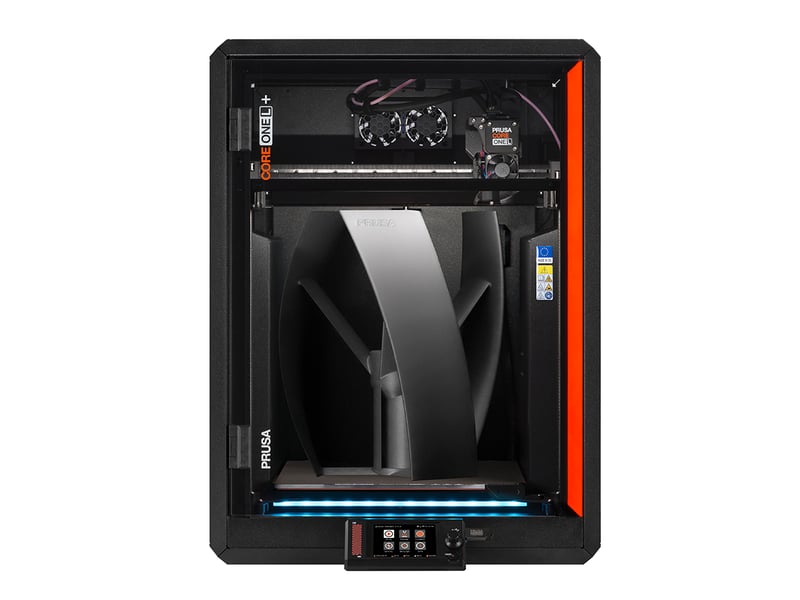 CORE One L+ with spare print tips sitting on a front rack